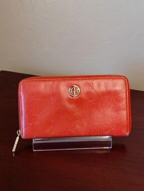 Tory Burch Robinson Continental Wallet in a Pumpkin Orange Leather